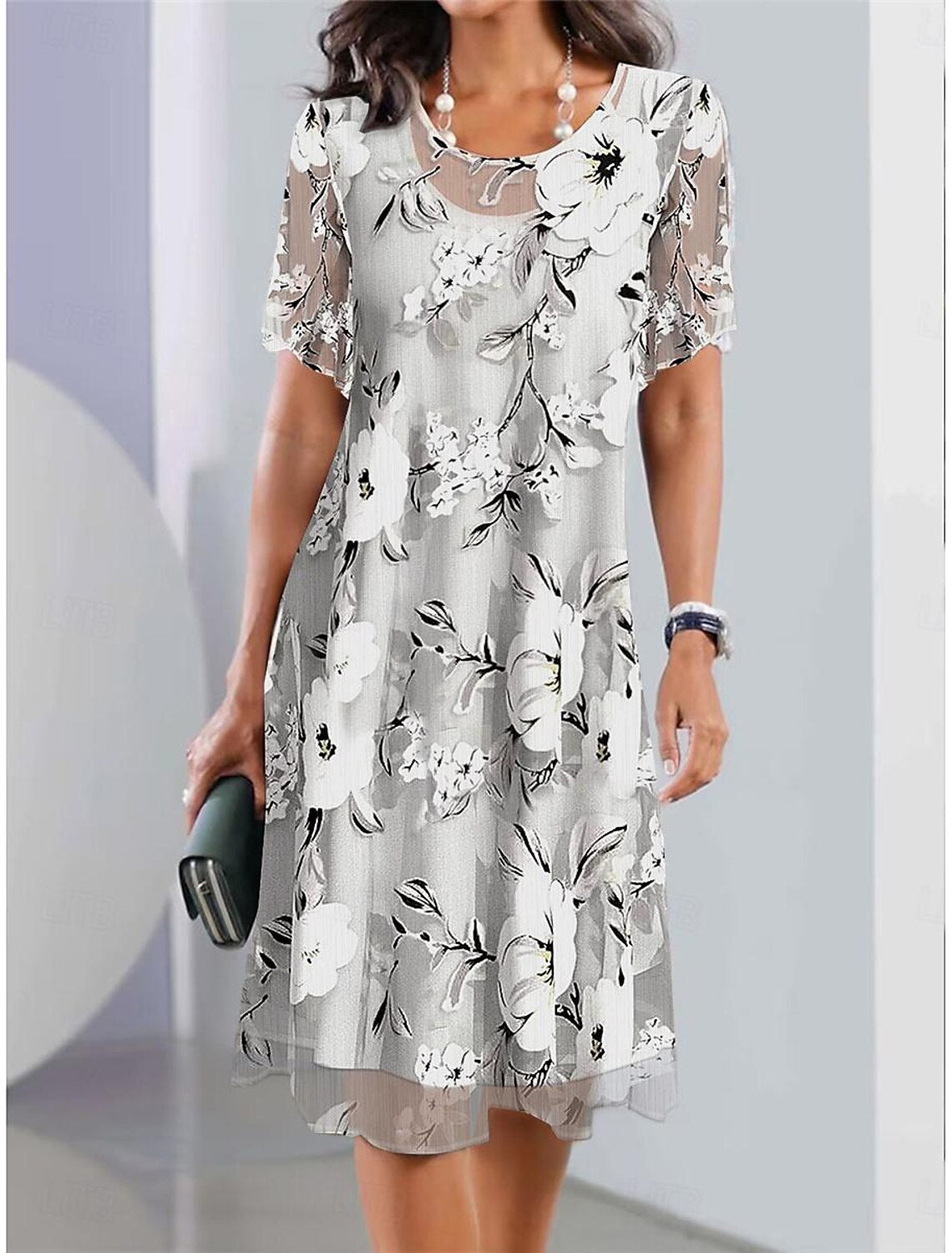 Vestido midi de cuello redondo de malla con estampado floral-ES